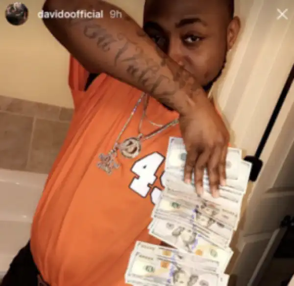 30Billion For The Account! Singer Davido Flaunts Wads Of Dollars In New Photos